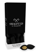 Indlæs billede til gallerivisning VERDENS BEDSTE... Gavepakning med fyldte bolcher (smag af sød lakrids og syrlig rabarber)